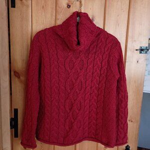 Brick red cable knit turtleneck sweater